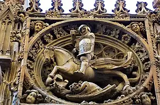 Sculpture de saint Georges sur la façade gothique du palais de la Generalidad.