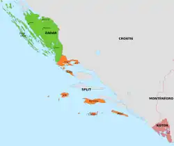 Un territoire disjoint en bord de mer.