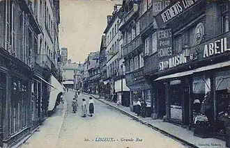 La Grande rue (devenue rue Henry-Chéron) sur une carte postale de la fin du XIXe ou du début du XXe&nbsp;siècle.