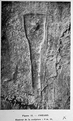 Hypogée n°24 : bas-relief motif de la « pelle ».