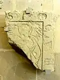 Fragment d'une dalle funéraire.