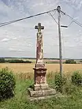 Croix de chemin sculptée.