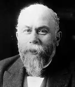 portrait de Chéron, barbiche et calvitie, le visage rond et l'air jovial