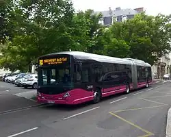 Un bus hybride du réseau Divia (Heuliez GX 427 avec la livrée Divia actuelle).