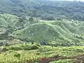 Vue des collines et des terres agricoles à Njap