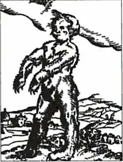 Gravure représentant un personnage debout, de trois quarts droite, couvert de poils, dont les mains et les pieds sont des pattes d'ours. La silhouette est gigantesque par rapport au village inscrit dans un paysage vallonné qui constitue la base de l'œuvre.