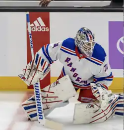 Photographie couleur d'un joueur de hockey sur glace
