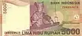 Tisserand Songket de Pandai Sikek, Sumatra occidental représenté au dos de 5000 Roupie indonésienne émis en 1998-2005, le tisserand également représenté dans la tenue de Minangkabau fait de Songket.