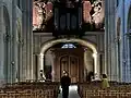 Vue générale de la porte sous la tribune de l'orgue.