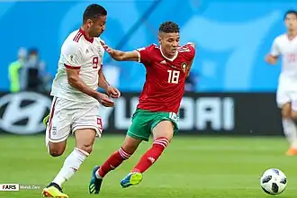 Harit en duel face à Omid Ebrahimi.