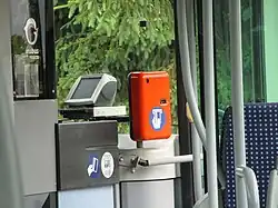 Photographie en couleurs d’un composteur.