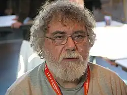 Portait couleur de face de Jean-Claude Fournier.