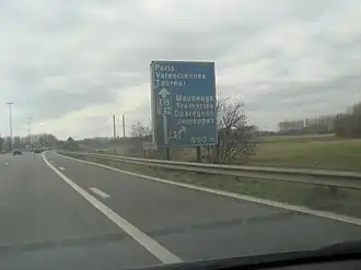 Panneau indiquant l'approche de l'échangeur