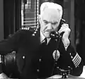 Joseph W. Girard, dans Officer Thirteen&nbsp;(en), film de 1932.