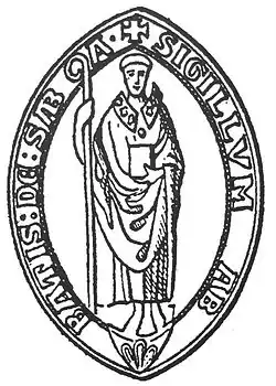 Sceau montrant un abbé debout dans un mandylion.