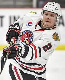 Photographie couleur d'un joueur de hockey sur glace