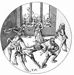 Des hommes dansant forment un cercle autour d'une femme