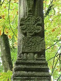 Détail de l’inscription au sommet