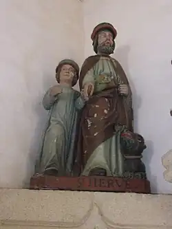 Saint Hervé entouré de Guiharan et du loup apprivoisé.