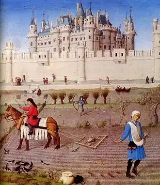 Miniature de laboureurs devant un château.