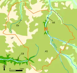 Vue d'une carte répartissant un territoire communal en grandes zones géologiques de couleurs différentes.