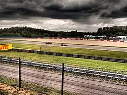 Photo de monoplaces Toro Rosso et Lotus sur le Nürburgring.