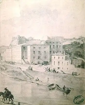 La caserne de Serin et le fort St-Jean,Balthazar Jean Baron, 1840-1850Arbres abattus, portique et mur démolis laissent voir le perron de l'hôtel de la Butte contigu au Grenier d’abondance. Contemporain de A. Comarmond.