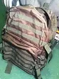 Un sac avec attaches MOLLE.
