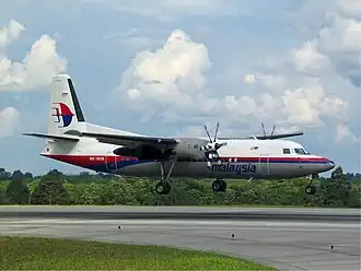 Un Fokker F50 de la Malaysia Airlines, semblable à celui impliqué dans l'accident.