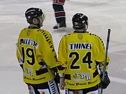 Photographie de Thinel et de Mallette de dos