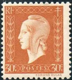 Photographie d'un timbre imprimé en bistre sur blanc, effigie féminine coiffée d'un bonnet phrygien encadrée de deux rameaux d'olivier stylisés.