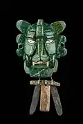 Masque pectoral trouvé dans une sépulture à Monte Alban, représentant le dieu chauve-souris zapotèque