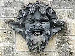 Trois des mascarons par Auguste Rodin (1878), aujourd'hui au  parc de Sceaux.