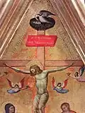 Dans certaines Crucifixions, au-dessus du titulus, l'artiste représente un nid avec un pélican mâle qui lacère sa poitrine d'un coup de bec pour ressusciter ses petits.