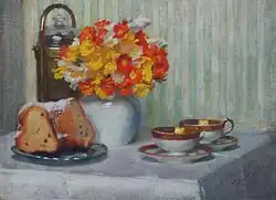 Tableau représentant une table fleurie avec deux tasse en porcelaine et un kouglof entamé.