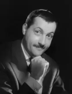 Michel Serrault(inspecteur Boudu)