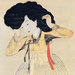 Miindo [Une beauté]. Peinture sur papier, XIXe&nbsp;siècle. Fondation Gansong, Séoul. Elle porte une gache.