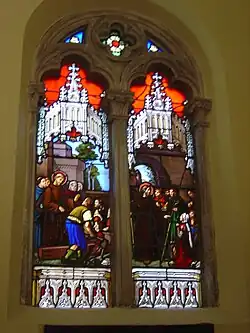 Vitraux néogothiques de la chapelle du Petit-Saint-Dié. Miracle de la poutre redressée par Déodat à Romont.