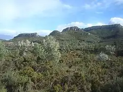 La Barcella, la Mola Llarga, lo Curolló, la Roca Mitxdia, Coll de la Creu.