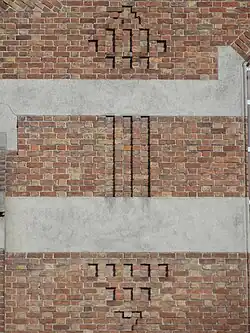 Détail d'un motif en briques.