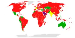 Carte du monde. La majorité des pays sont colorés en rouge.
