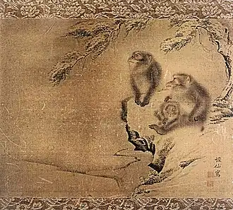 Des singes dans la neige