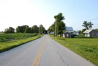 La frontière canado-américaine à Morses Line marque l'extrémité sud de la route 235.