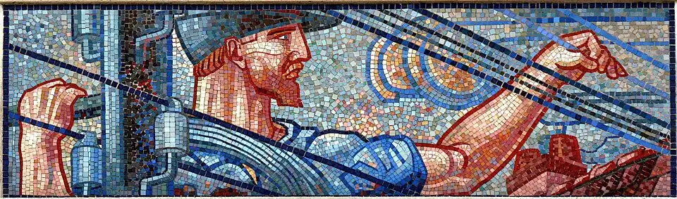 Installation de lignes téléphoniques sur un poteau.