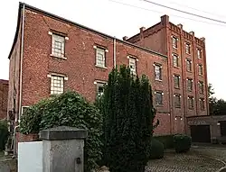 Ancienne minoterie, vue de la rue de la Paix-Dieu