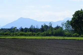 Vue du mont Musinè depuis la campagne de San Mauro.