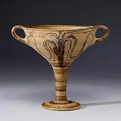 Vase à boire (kylix). Seiche étendant ses tentacules de chaque côté. Helladique récent IIIA-B; v. 1200. Walters Art Museum