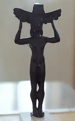  Kouros en guise de poignée, petit bronze archaïque, 560-540 av. J.-C.