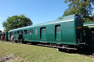 Voiture de 3e&nbsp;classe avec compartiment à bagages ex-Nord-Belge. À noter la vigie et l'absence d'intercirculation.