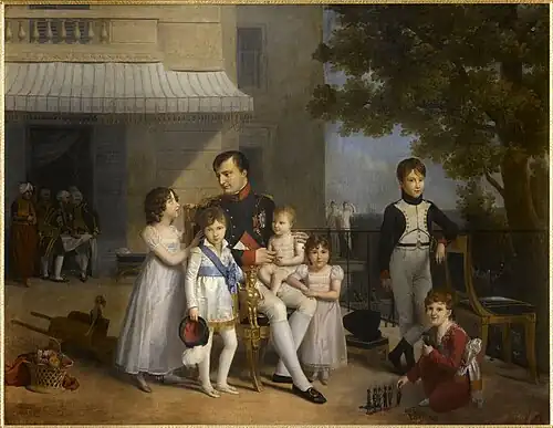 Napoléon&nbsp;Ier sur la terrasse de Saint-Cloud, avec ses neveux et nièces. L'empereur tient Charles-Louis-Napoléon sur ses genoux. Toile de Jean-Louis Ducis, 1810.